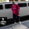 CHRISTAIN rapper CHANCE standing in front of J.O.T. aka GRANDE GATO's Stretch HUMMER limo at 2004 UMOJA FESTIVAL(MIAMI, FL)